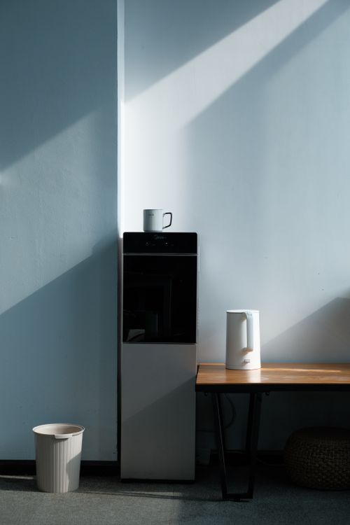Modern water dispenser in a home setting