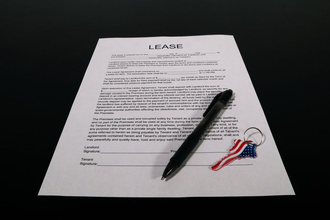 Person reviewing a rental agreement document